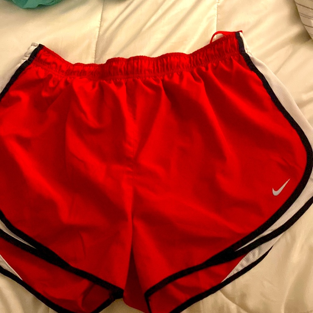 Nike , red athletic shorts,great condition
